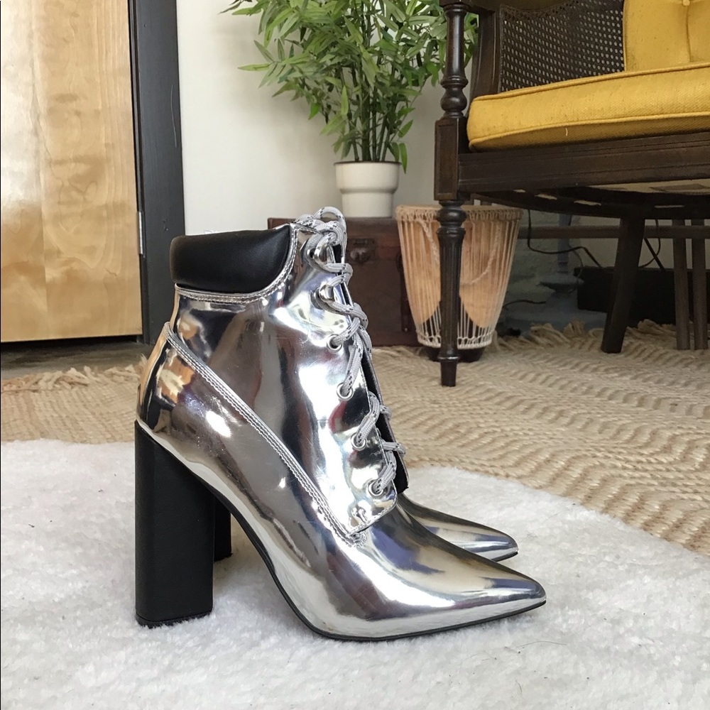Metallic silver pointed toe booties